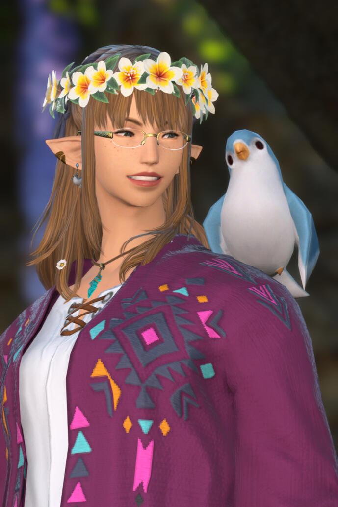 Ariane with bluebird A light-skinned female Elezen character with freckles, dark green eyes, and golden blonde hair in the Half Times Two hairstyle. She is wearing a white Champa flower crown, gold elegant rimless glasses, a bluebird earring, and an Ala Mhigan Gown in regal pu