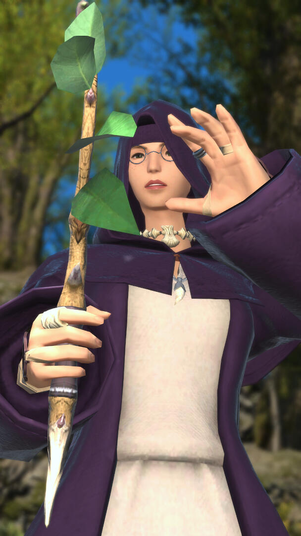 Ariane in a purple and white cowl, with a budding maple wand in hand, learning her first spells in conjury.